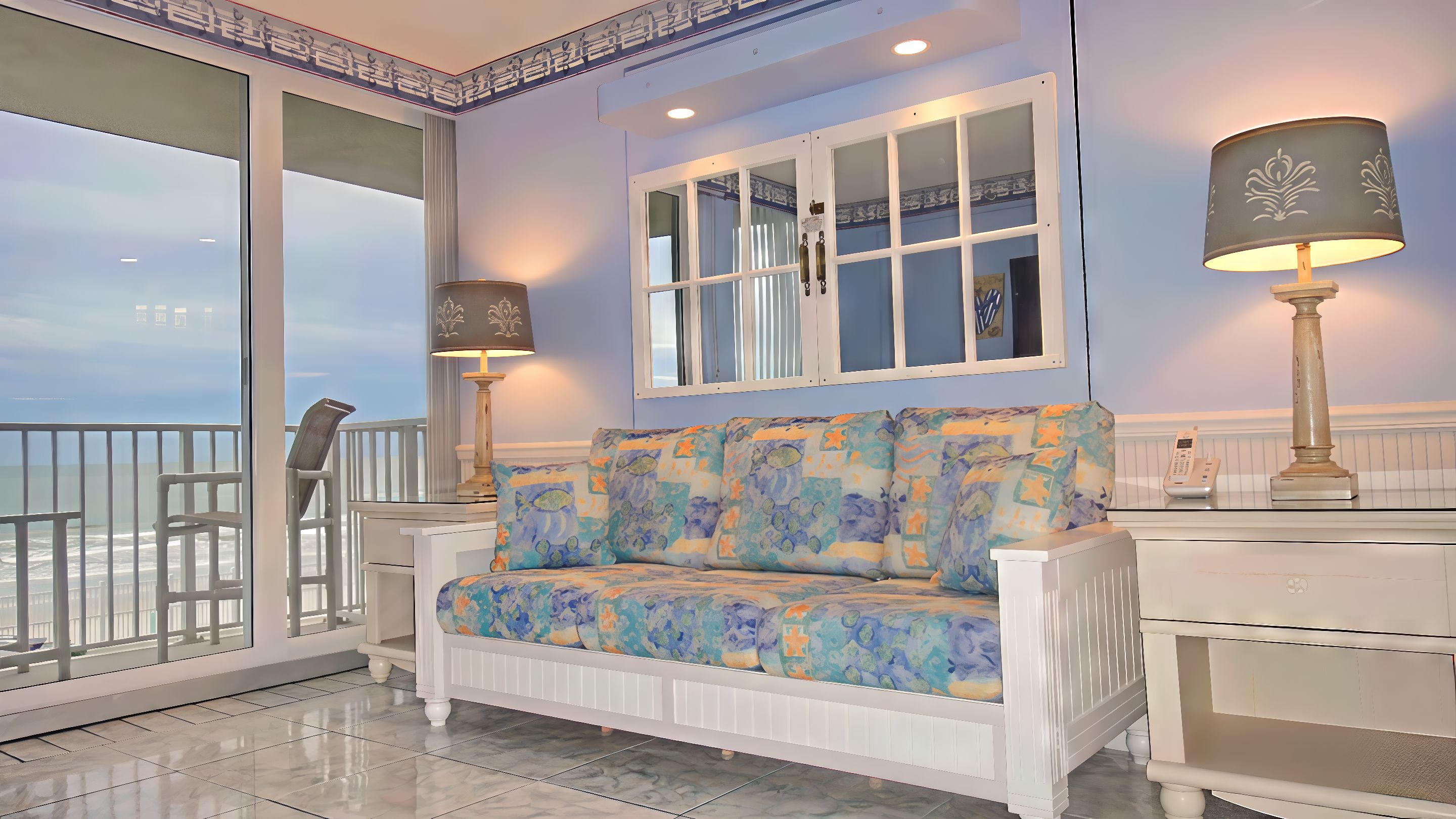LIVING AREA: Queen Murphy Bed Converts Living Room Into Priv